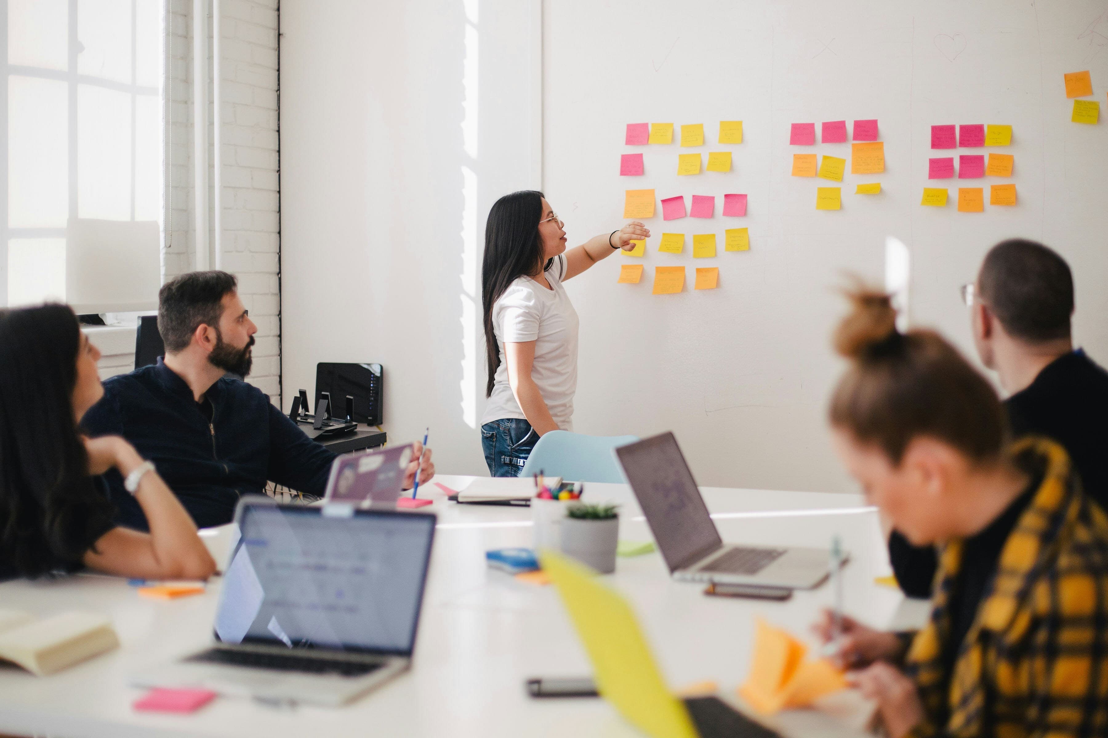 Man presenting to colleagues